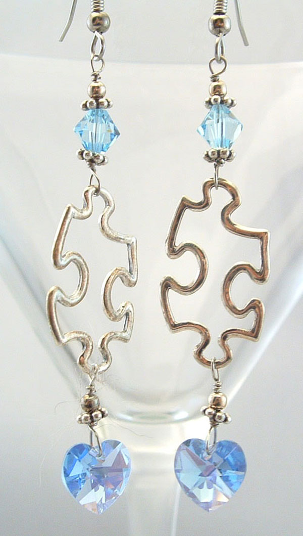 Solid silver puzzle piece earrings with Swarovski crystals