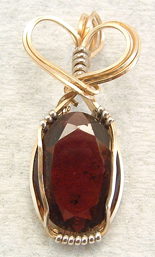 Garnet pendant with gold-filled and silver wire
